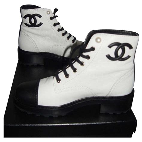 black and white Chanel boots